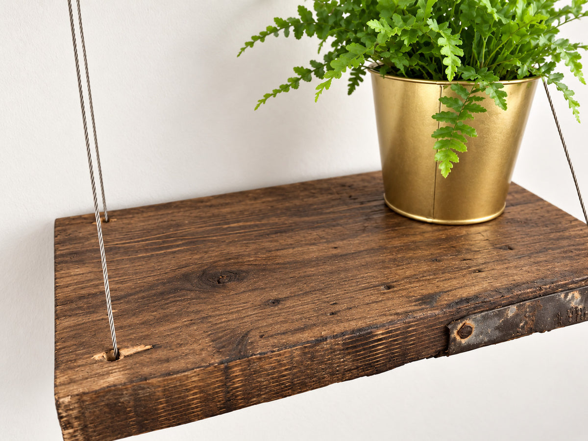Arundel reclaimed wood hanging shelf in Jacobean Dark Oak, suspended with steel cables.