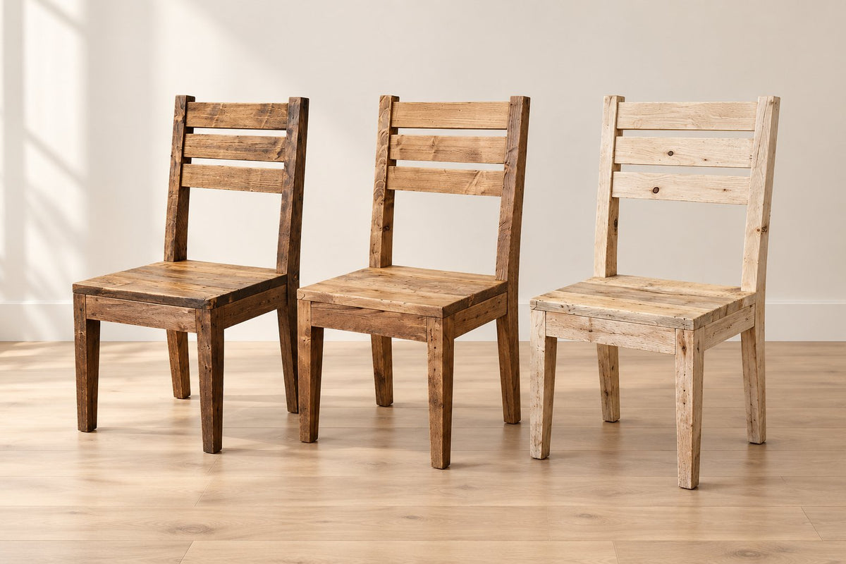 Elm reclaimed wood dining chair set showing three chairs in dark, medium and natural finishes against a warm neutral wall.