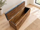 Lockmere reclaimed wood storage bench with its cushioned lid open, showing the interior and fabric gaming-table lid dividers.