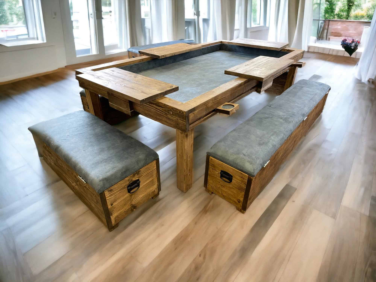 Reclaimed-wood gaming table with removable timber covers and three upholstered storage benches.