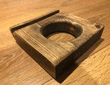 Dark-stained wooden game-table accessory with a circular recessed opening and rear slot.