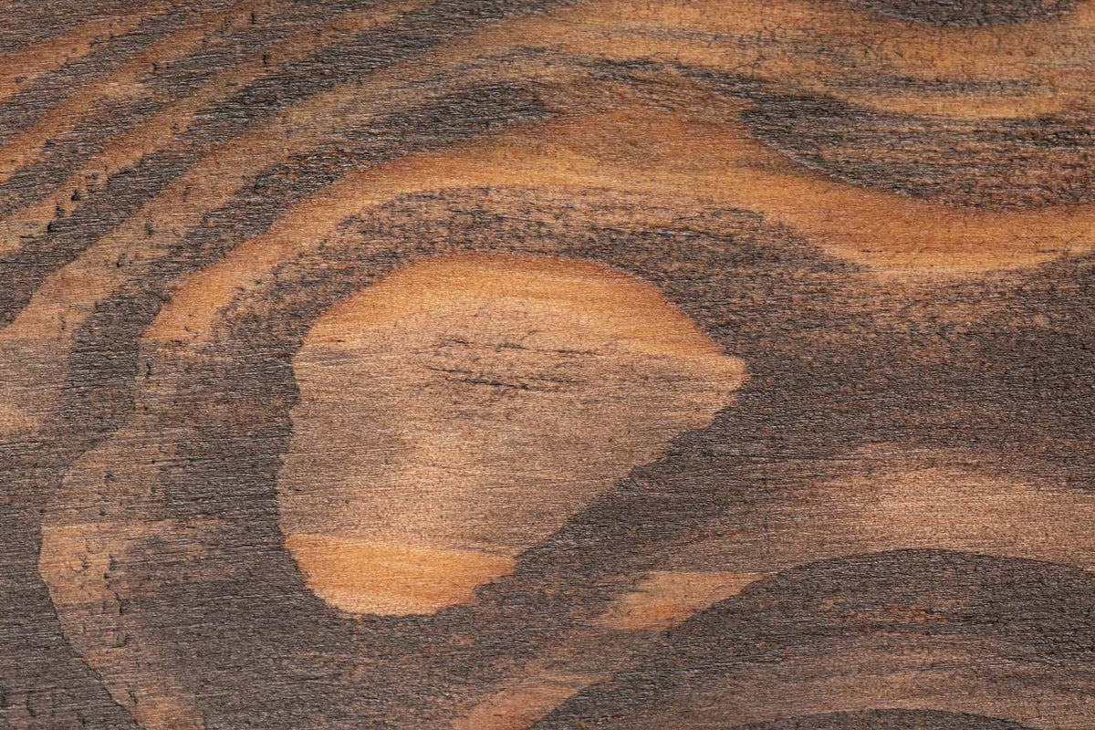 Dark-stained reclaimed oak grain.