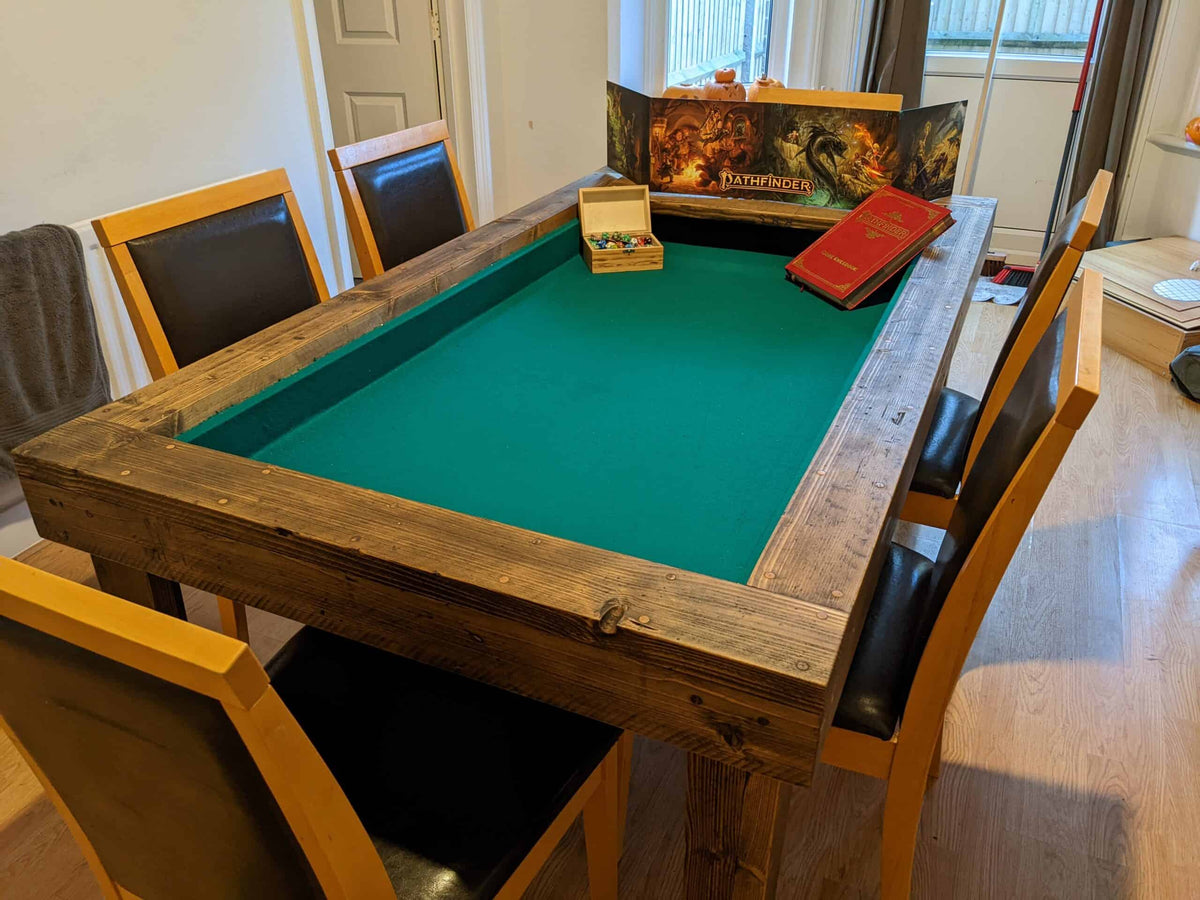 Reclaimed wood gaming table with a green baize playing surface.