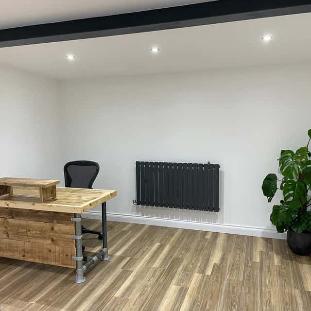 Industrial reclaimed-wood office desk with black steel legs