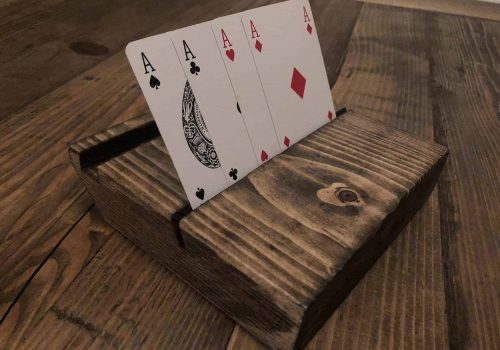 Card holder fitted to a gaming table.