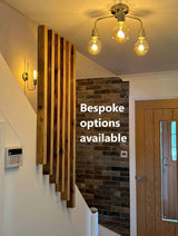 Vertical wooden-slat stair banister with the words “Bespoke options available”.