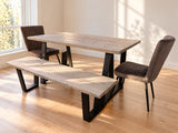 Stockholm reclaimed scaffold wood dining table and matching bench with black metal legs in a Scandinavian dining room.