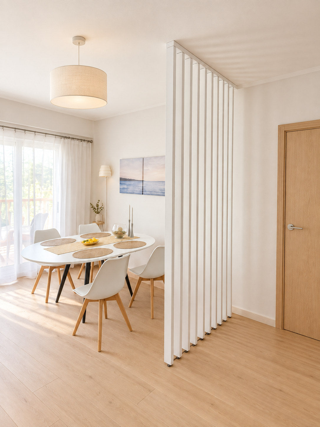 Woodward white painted room divider with vertical slats and a ceiling batten in a Scandinavian dining room.